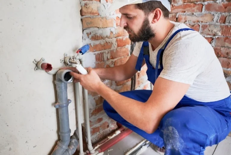 A plumber repair pipe